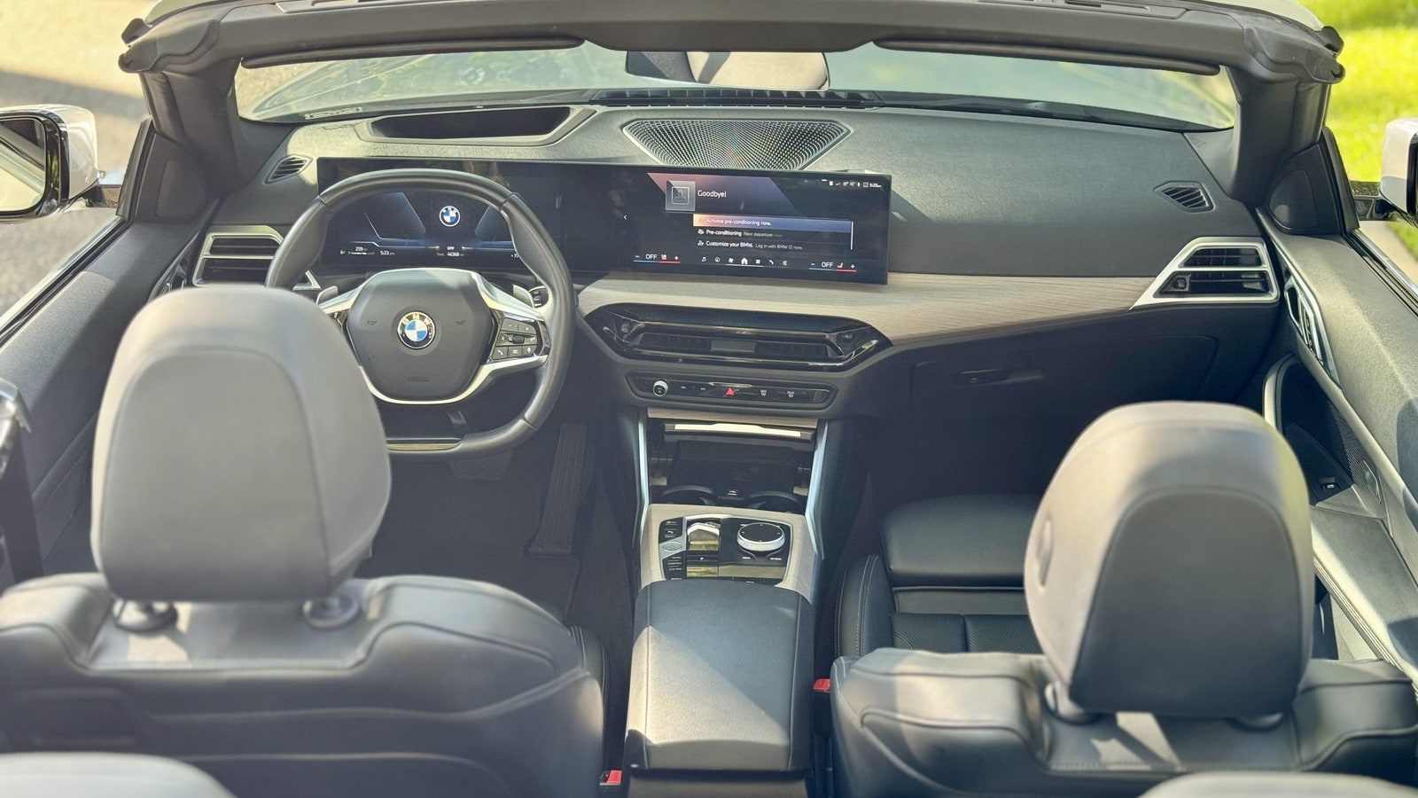 Cabin of the white BMW 430i convertible with the roof down