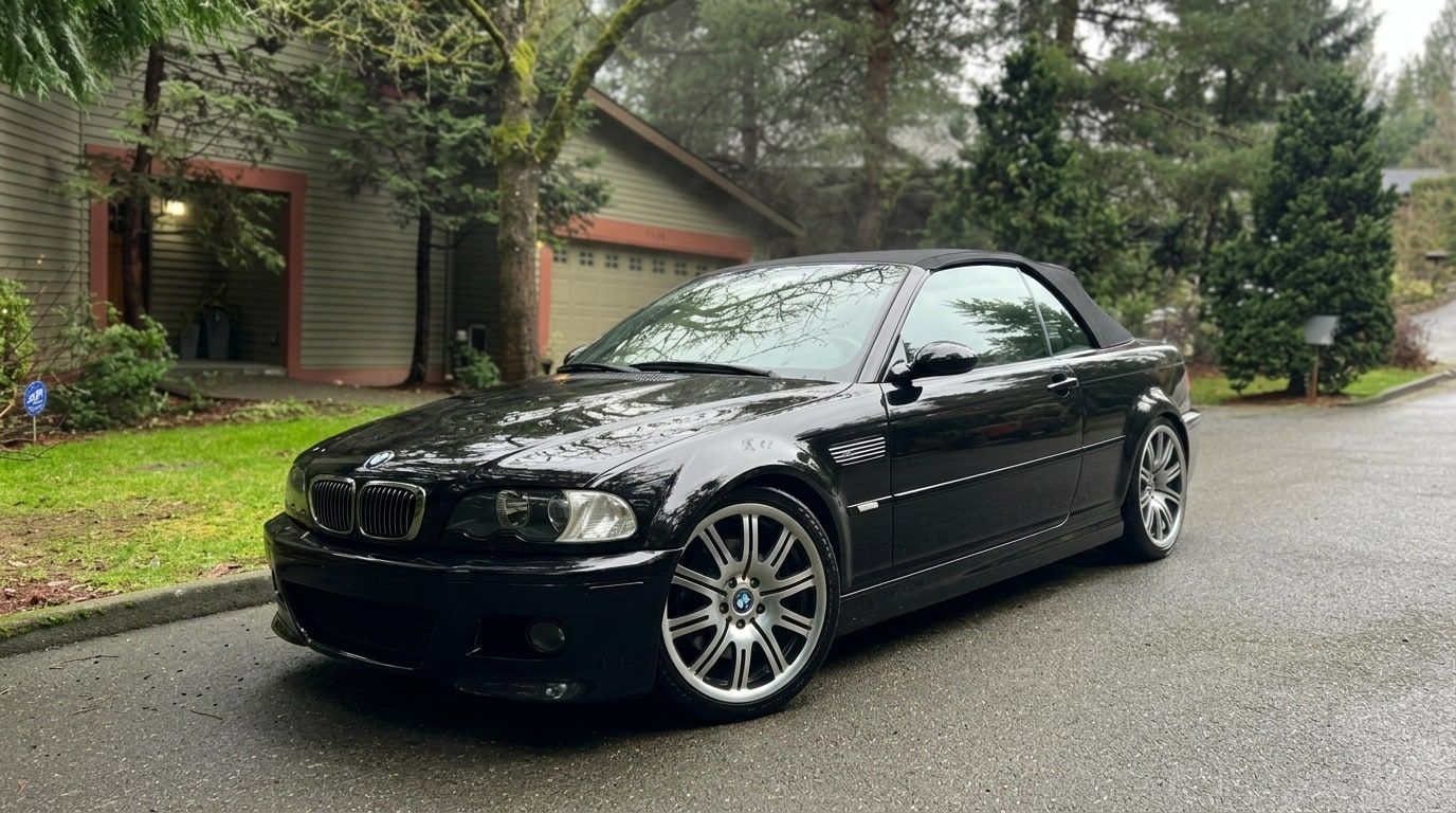 Black BMW M3 Convertible, photo 2 of 3