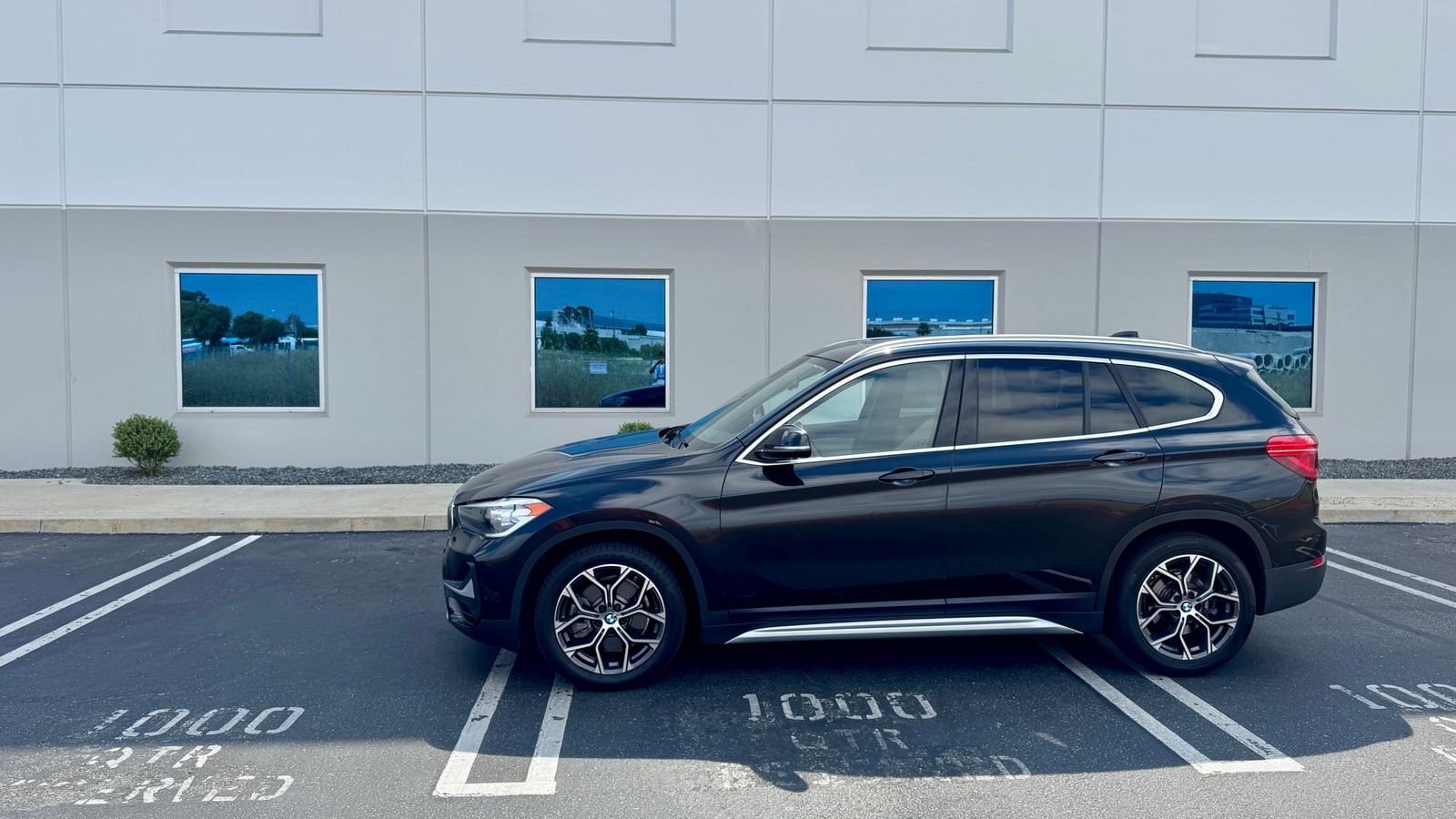 Black BMW X1 in profile
