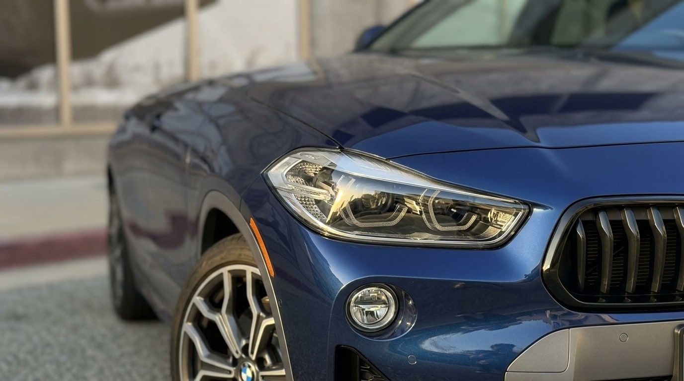 Blue BMW X2, photo 3 of 3