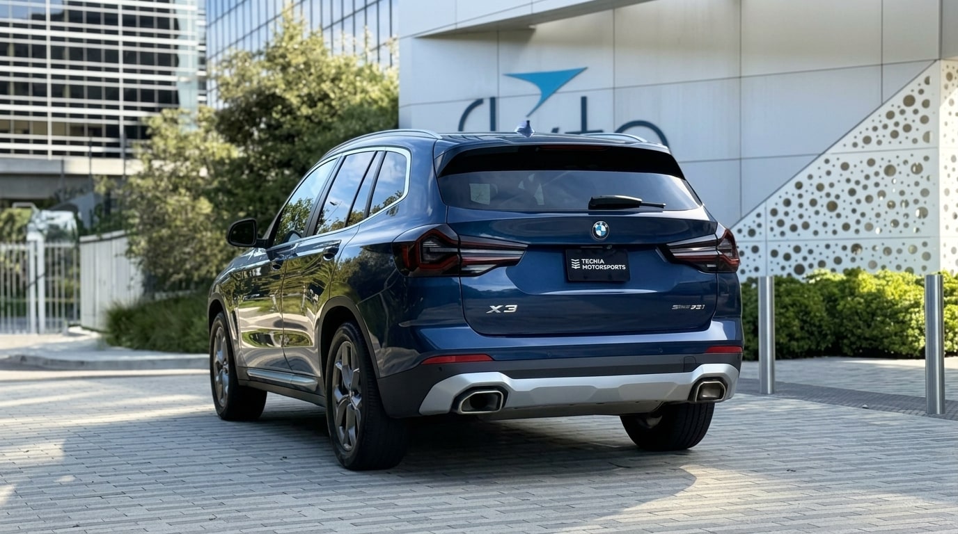 Blue BMW X3 from the rear three-quarter on a Playa Vista plaza