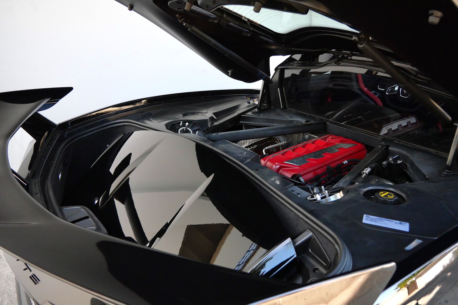The 6.2-litre V8 of the Corvette under its glass engine cover