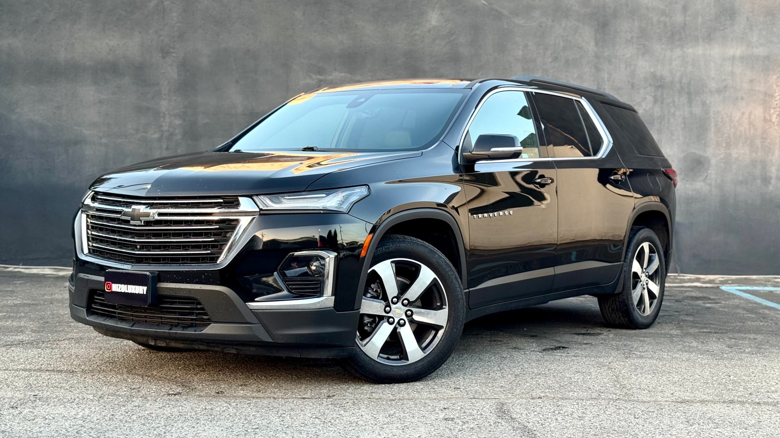 Black Chevrolet Traverse from a front three-quarter