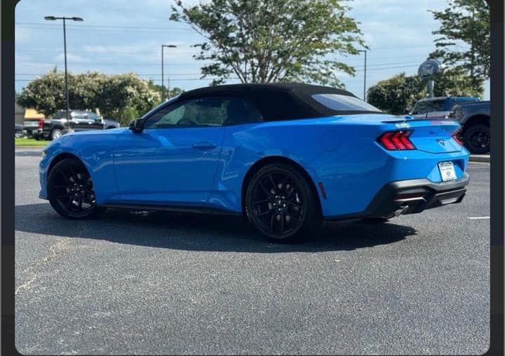 Blue Ford Mustang available to rent in Los Angeles, front three-quarter view