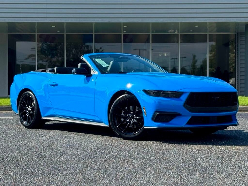 Blue Ford Mustang Convertible with the roof down