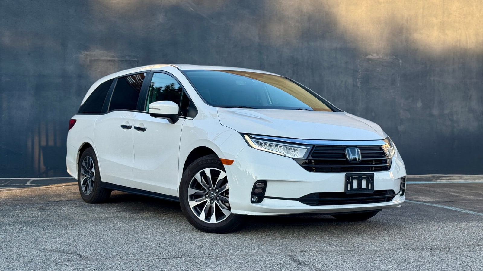 White Honda Odyssey from a front three-quarter