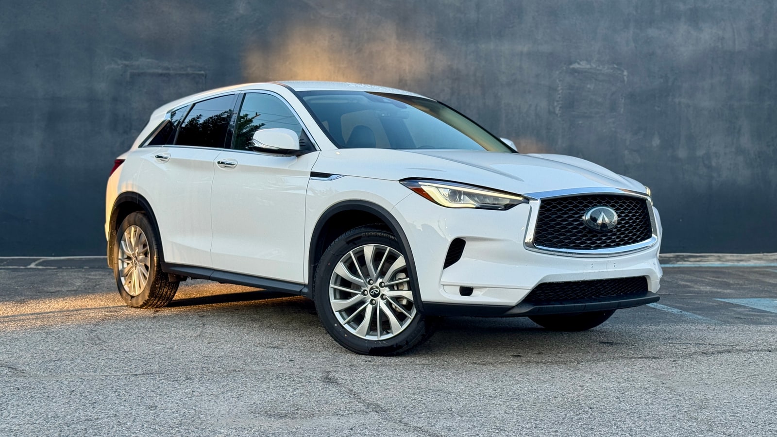 White Infiniti QX50 from a front three-quarter