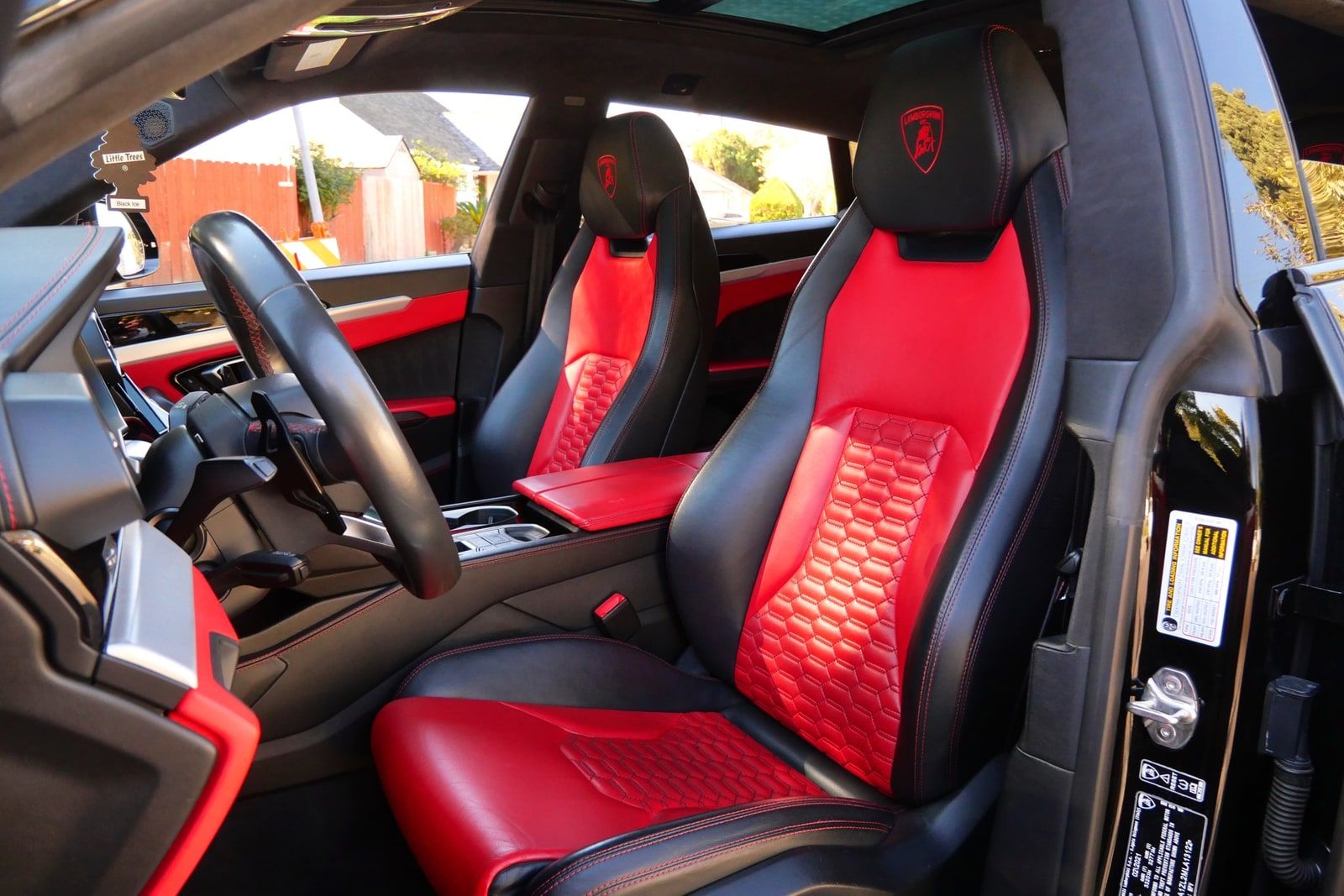 Red quilted leather seats in the black Lamborghini Urus