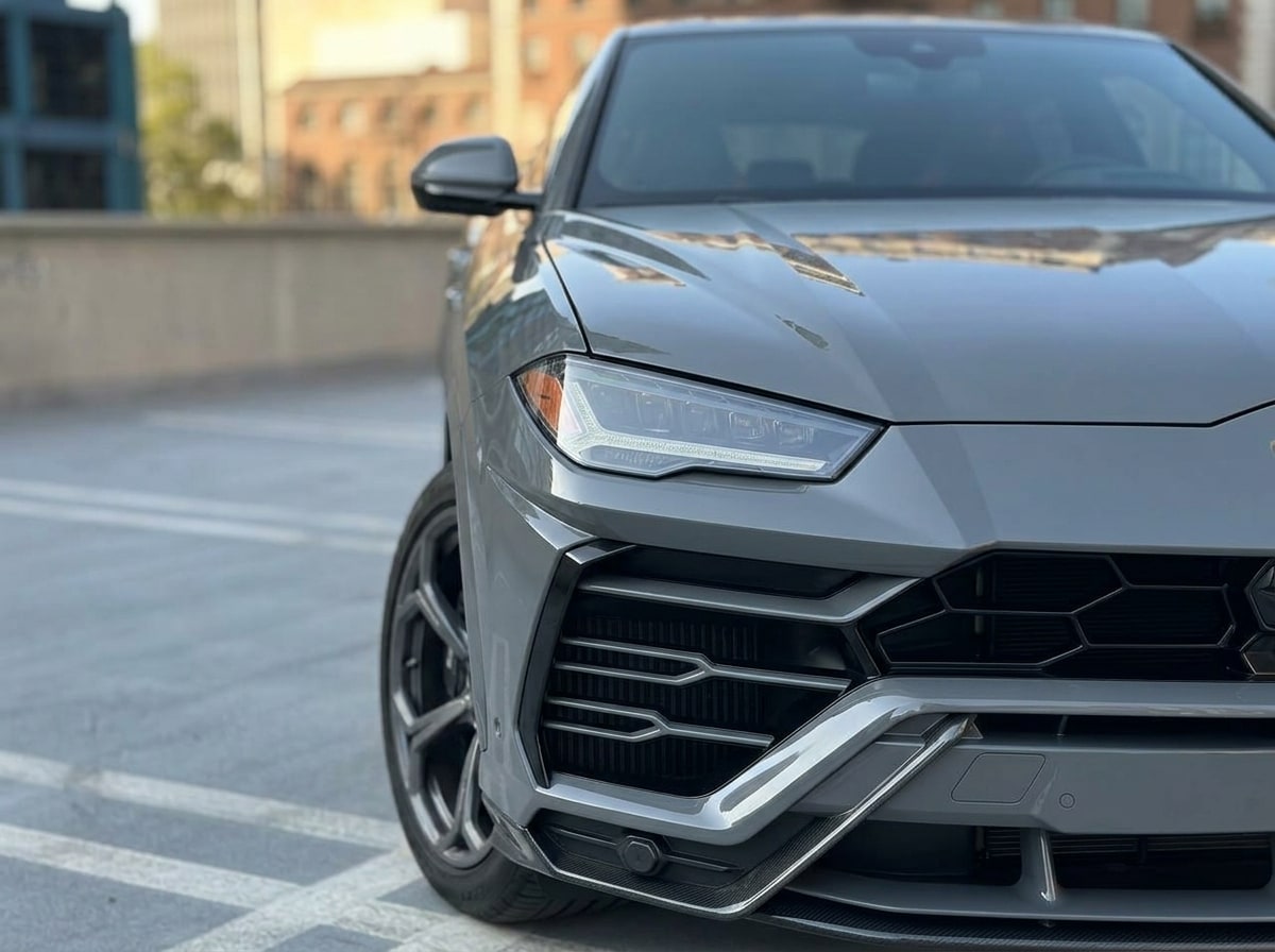 Headlamp and front intake of the grey Lamborghini Urus