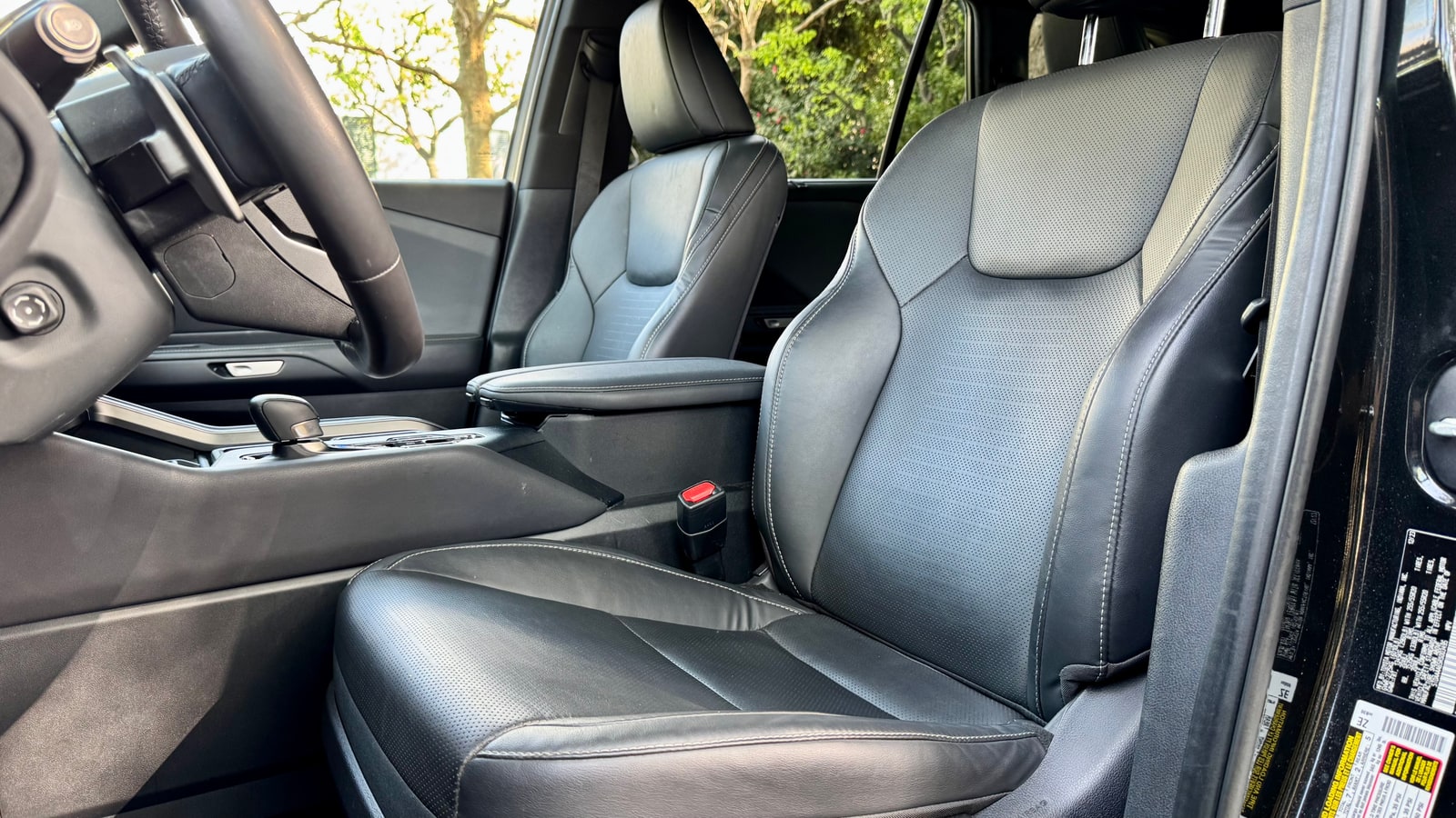 Front seats of the Lexus TX in black leather