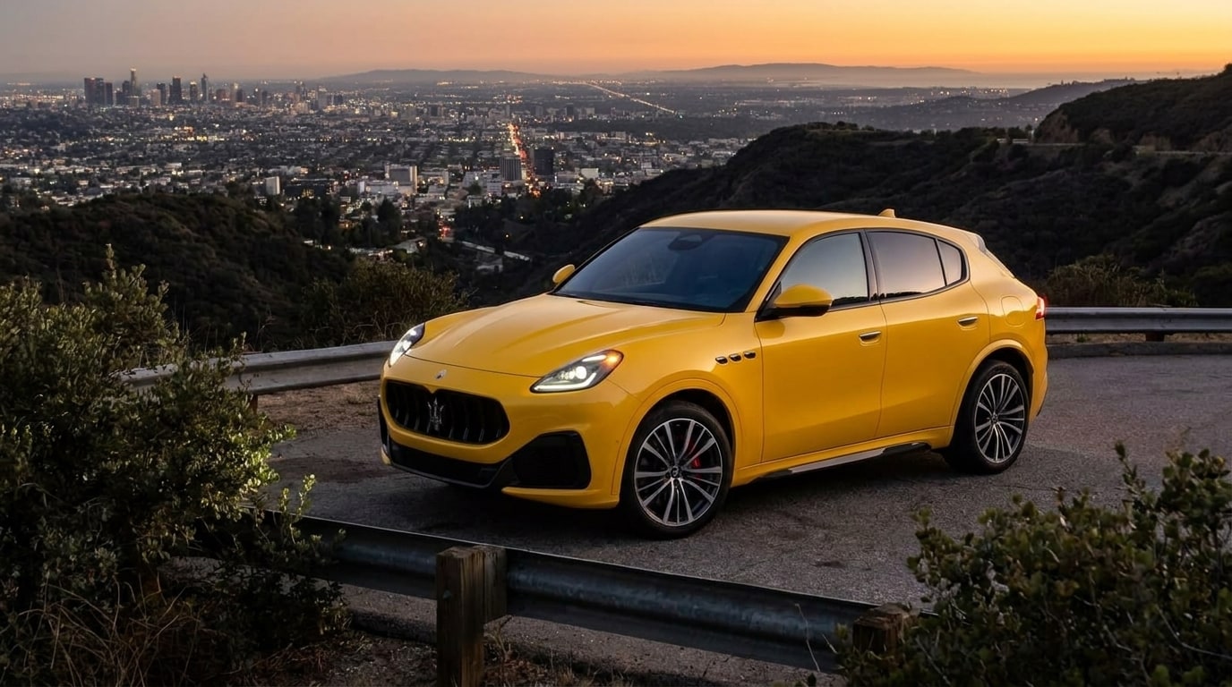 Yellow Maserati Grecale Trofeo on a canyon road above Los Angeles at dusk
