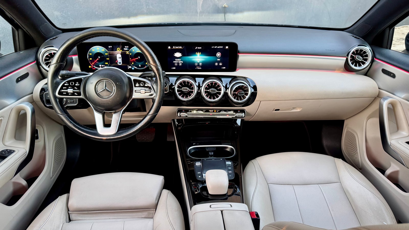 Dashboard and twin screens of the Mercedes A220 in cream