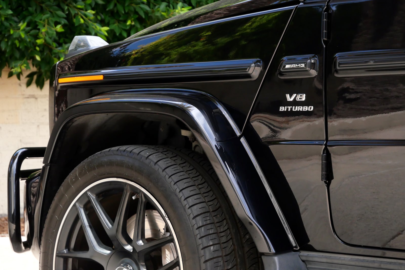 V8 BITURBO badge and side exhaust of the Mercedes-AMG G 63