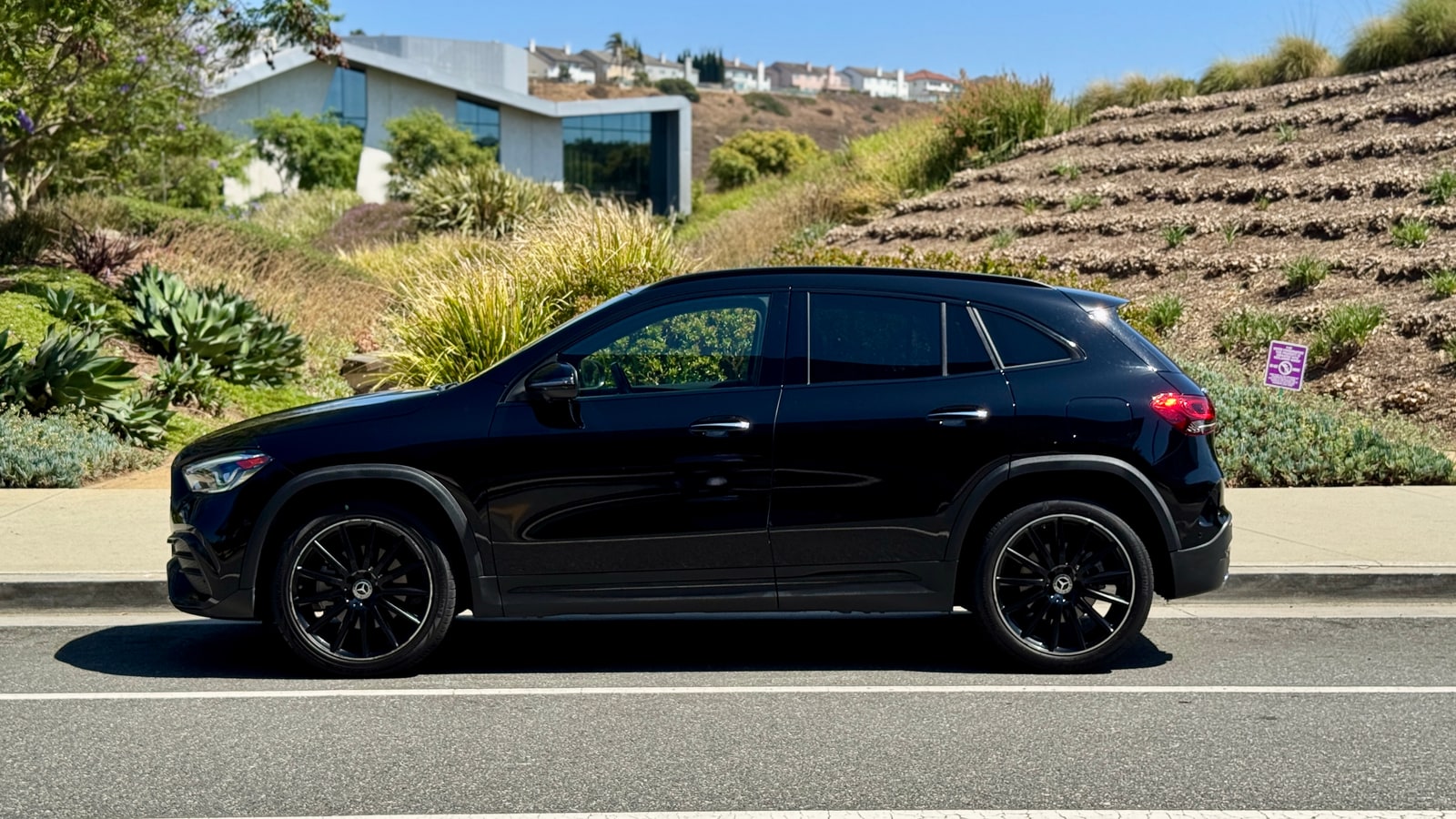 Black Mercedes GLA in profile