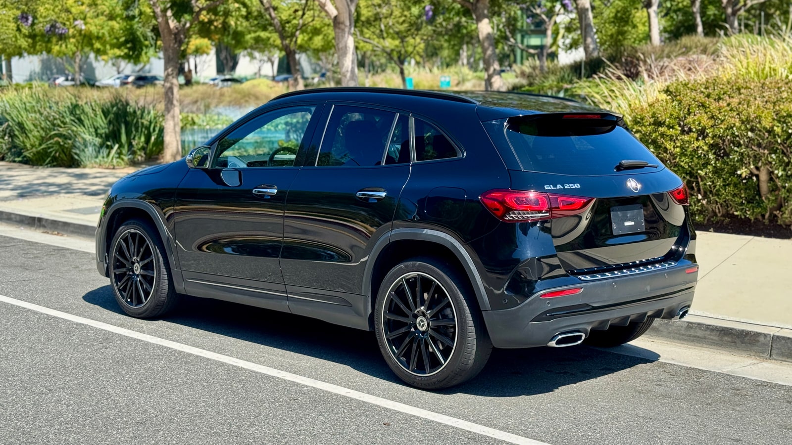 Black Mercedes GLA from the rear three-quarter