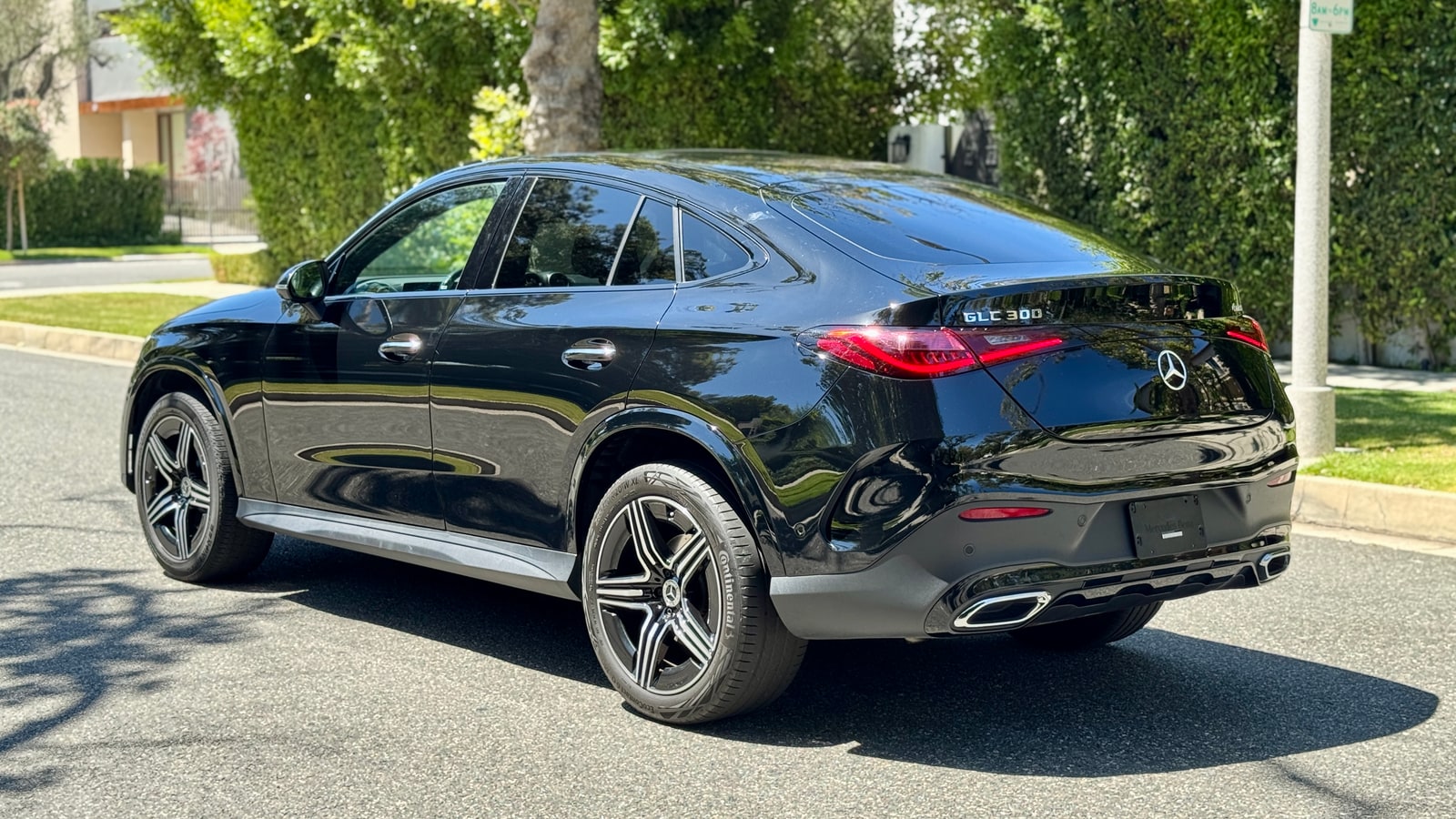 Black Mercedes GLC Coupé from the rear three-quarter