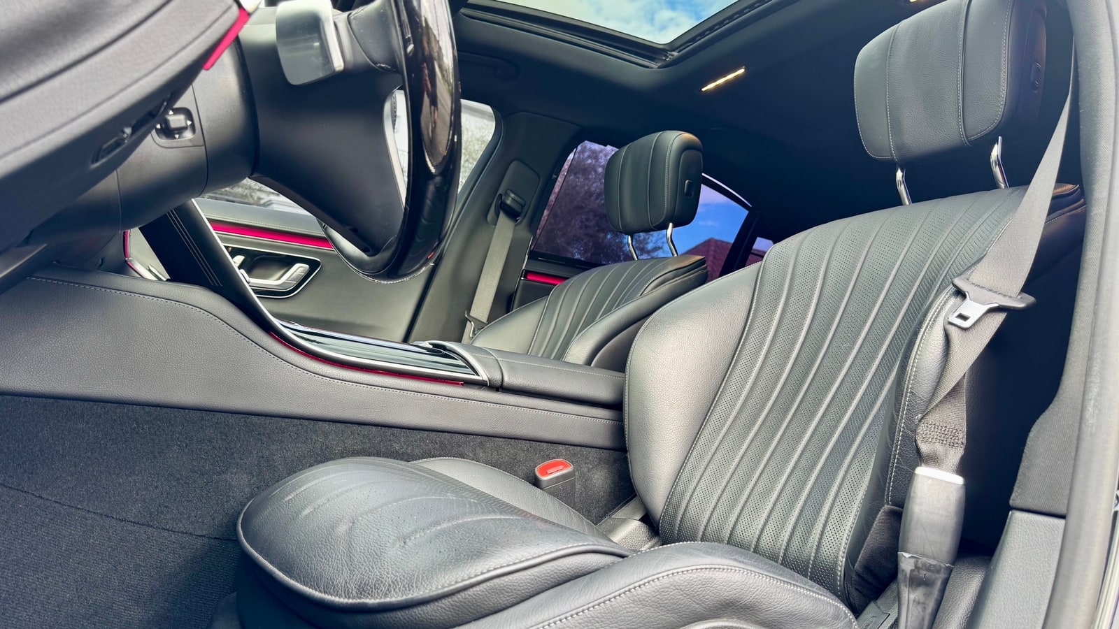 Black pleated leather front seat of the Mercedes S 580 under the glass roof