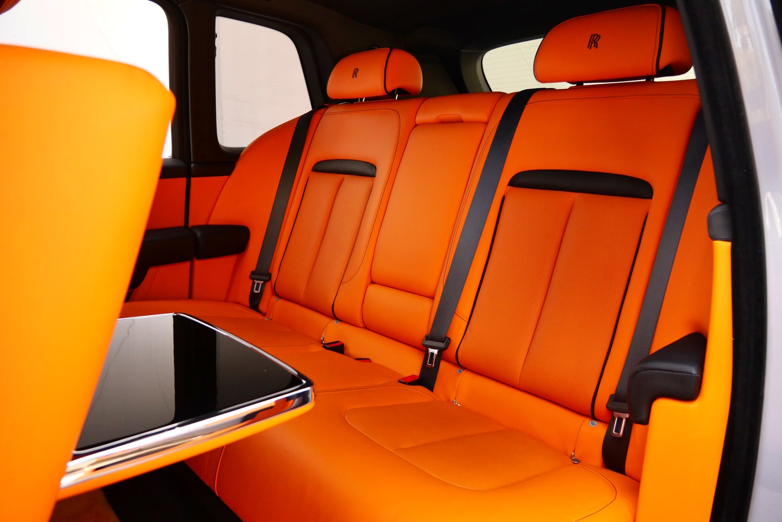 Mandarin orange rear seats of the Rolls-Royce Cullinan