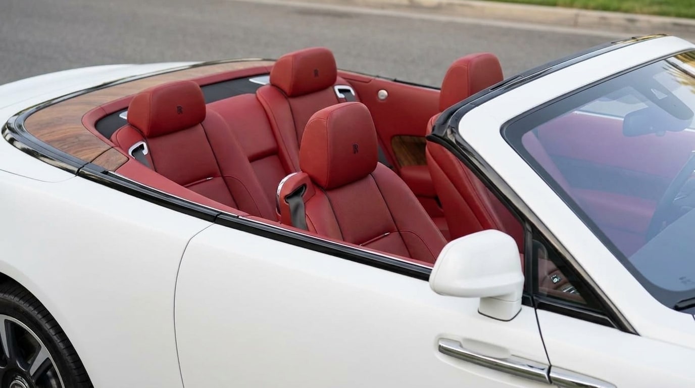 Red leather interior of the matte white Rolls-Royce Dawn