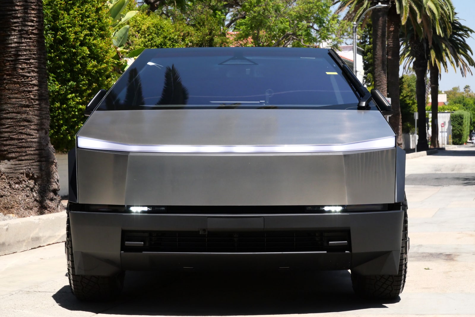 Tesla Cybertruck head-on with its full-width light bar