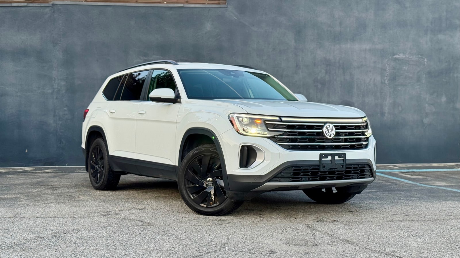 White Volkswagen Atlas from a front three-quarter